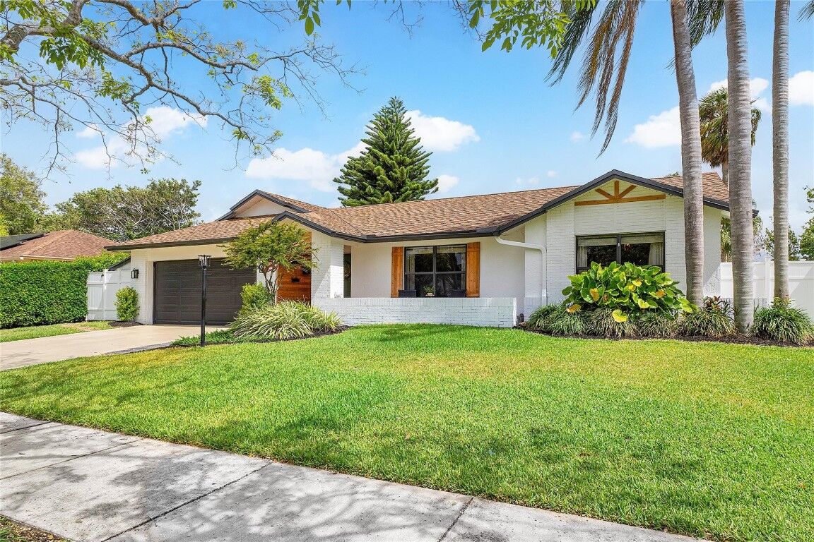 Property Photo:  4225 NW 7th Place  FL 33442 