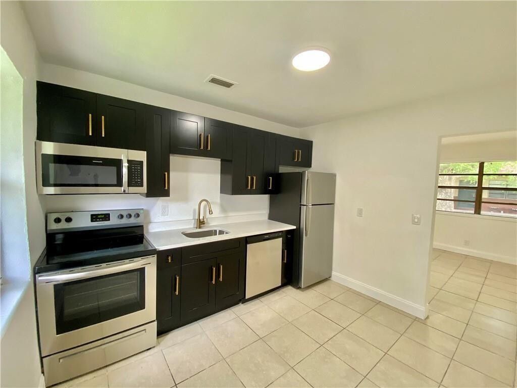 Property Photo:  721 NW 1st Court  FL 33009 