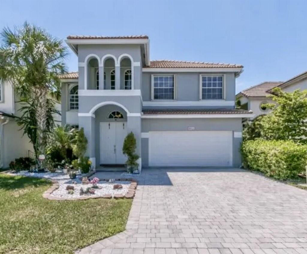 Property Photo:  6911 Sea Daisy Drive  FL 33462 