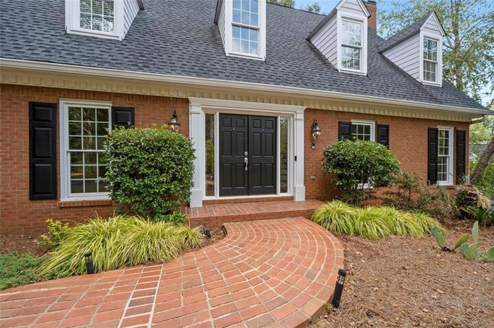 Property Photo: 8705 River Bluff Lane GA 30076