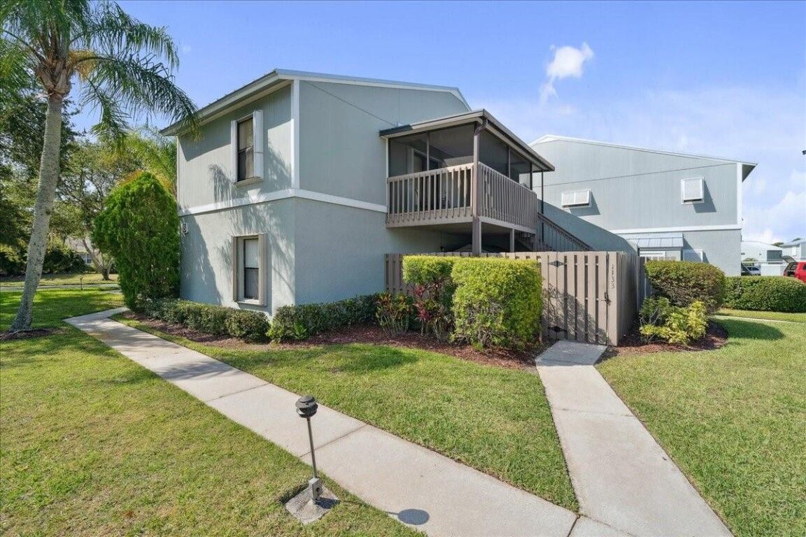 Property Photo: 1133 Breezy Way 8H FL 32958