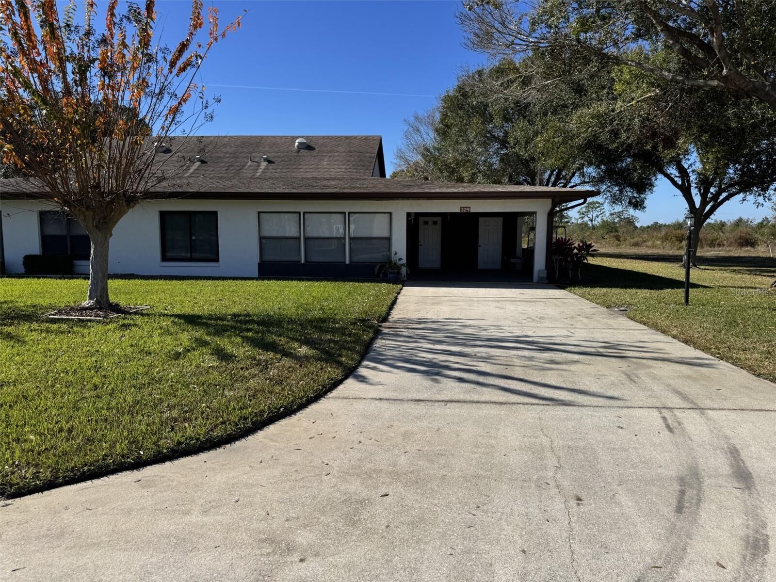 Property Photo:  329 Genesis Pointe Drive 329  FL 33859 