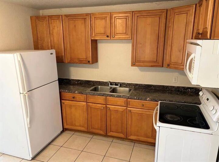 Property Photo:  717 46th St  FL 33407 