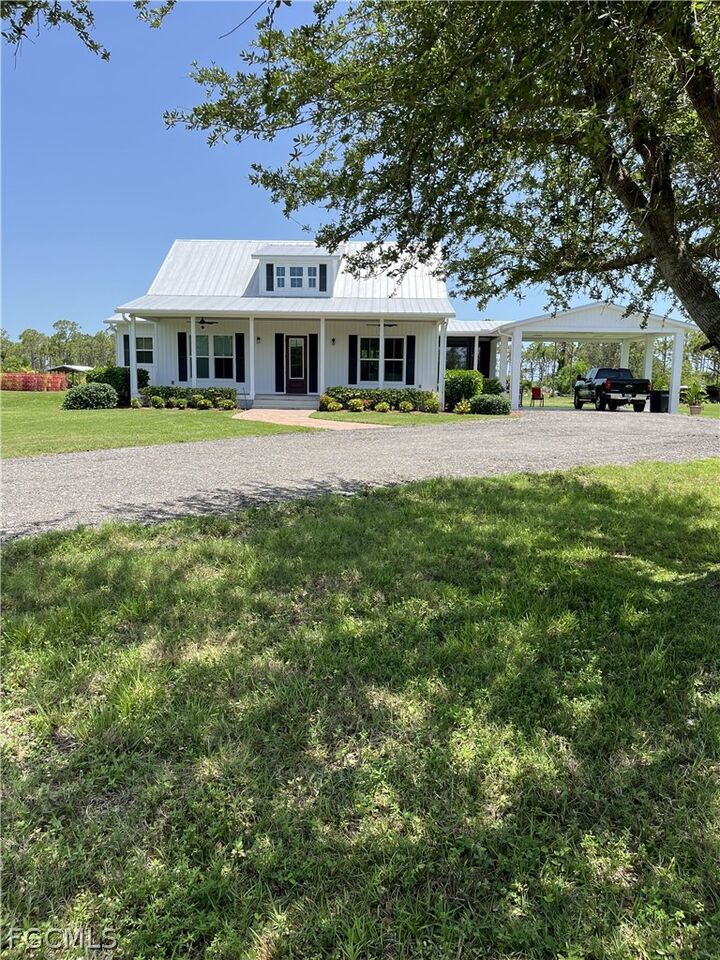 Property Photo:  4093 Sunshine Boulevard  FL 33956 