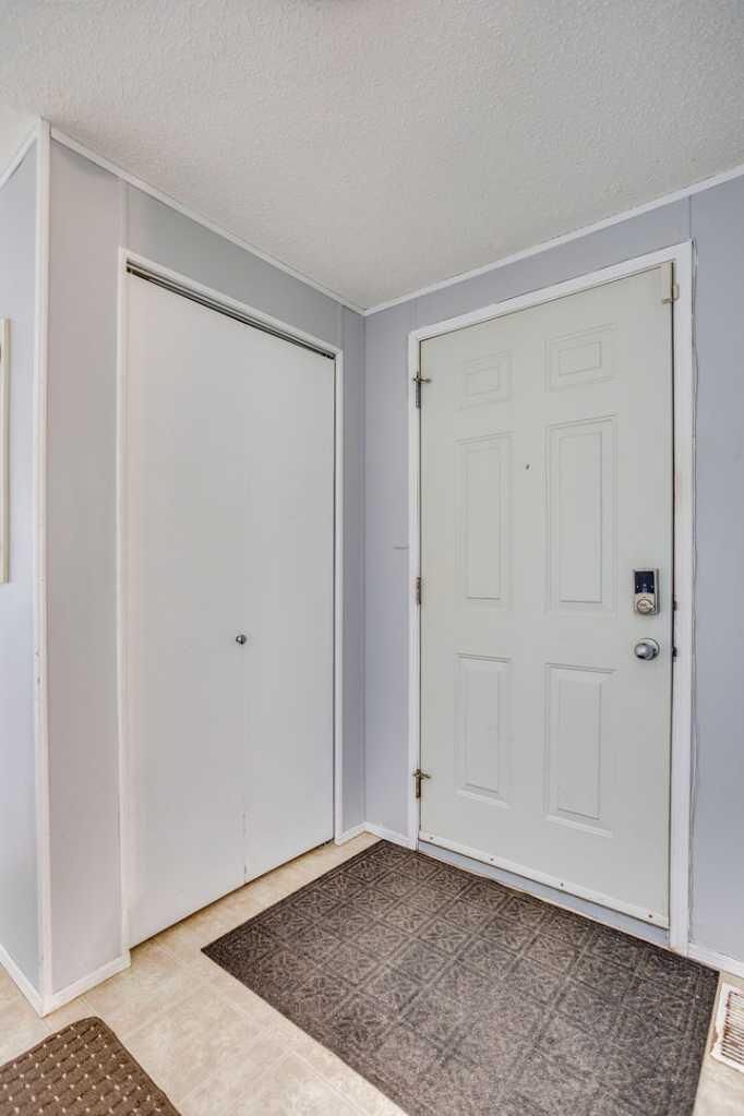 Property Photo: 209 Waterhouse Street AB T9K 2T1