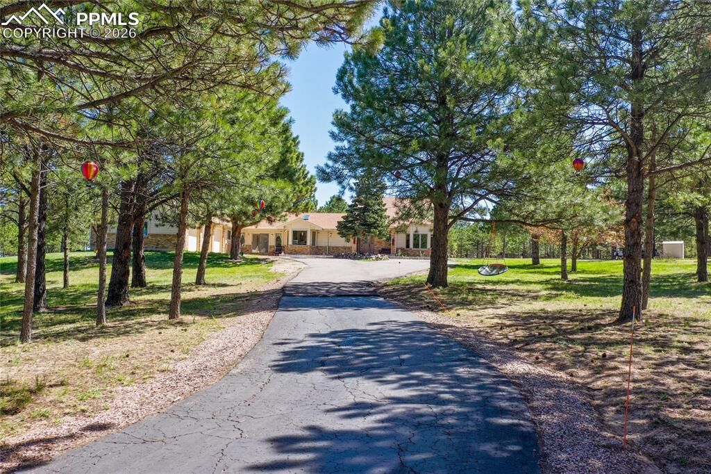 Property Photo:  390 E Stirrup Trail  CO 80132 