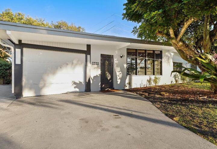 Property Photo:  6934 Tradewind Way  FL 33462 