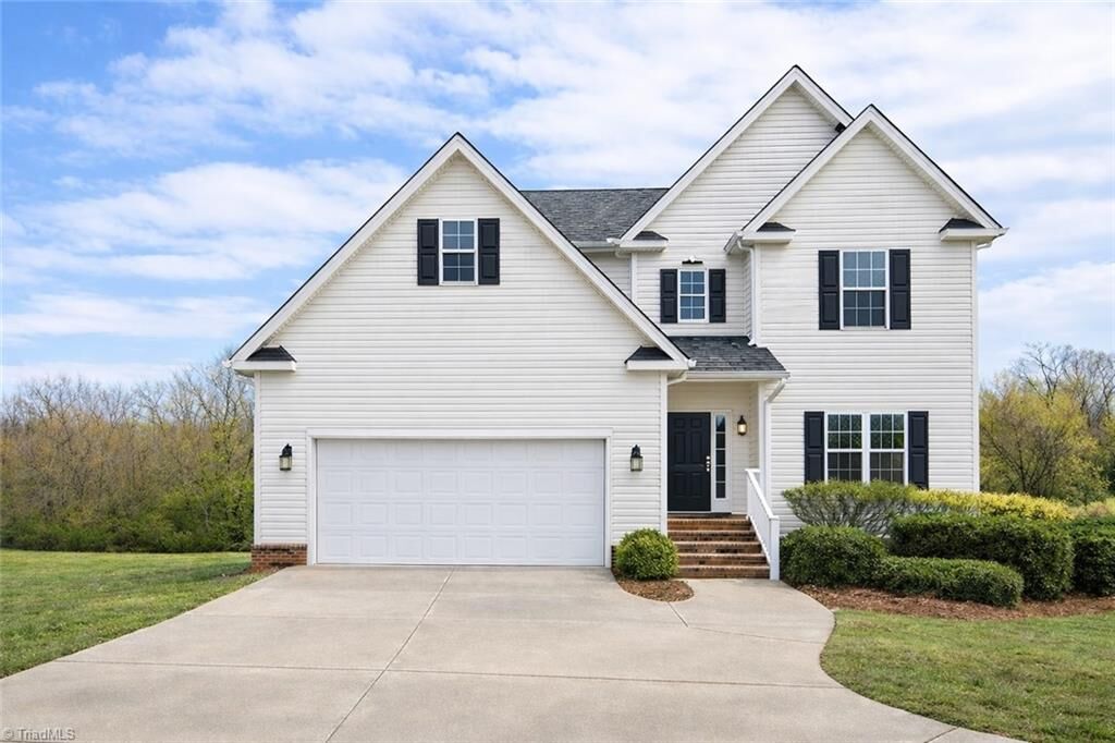 Property Photo:  5221 Belews Creek Road  NC 27051 