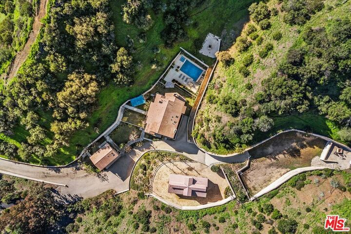 Property Photo:  4099 Mandeville Canyon Rd  CA 90049 