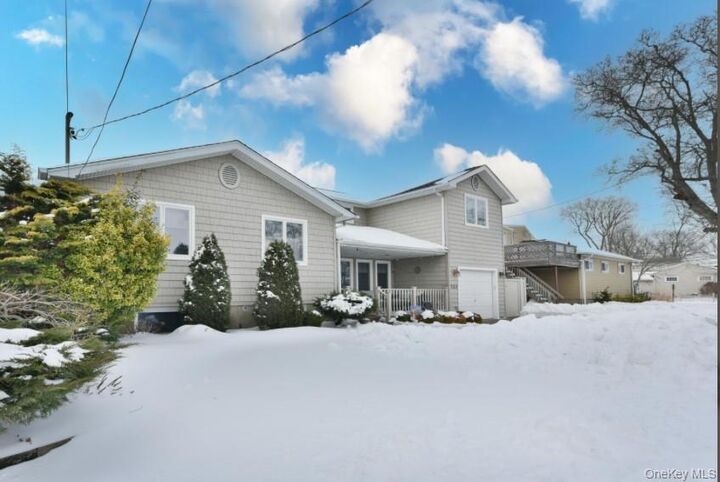 Property Photo:  320 Roosevelt Avenue  NY 11762 