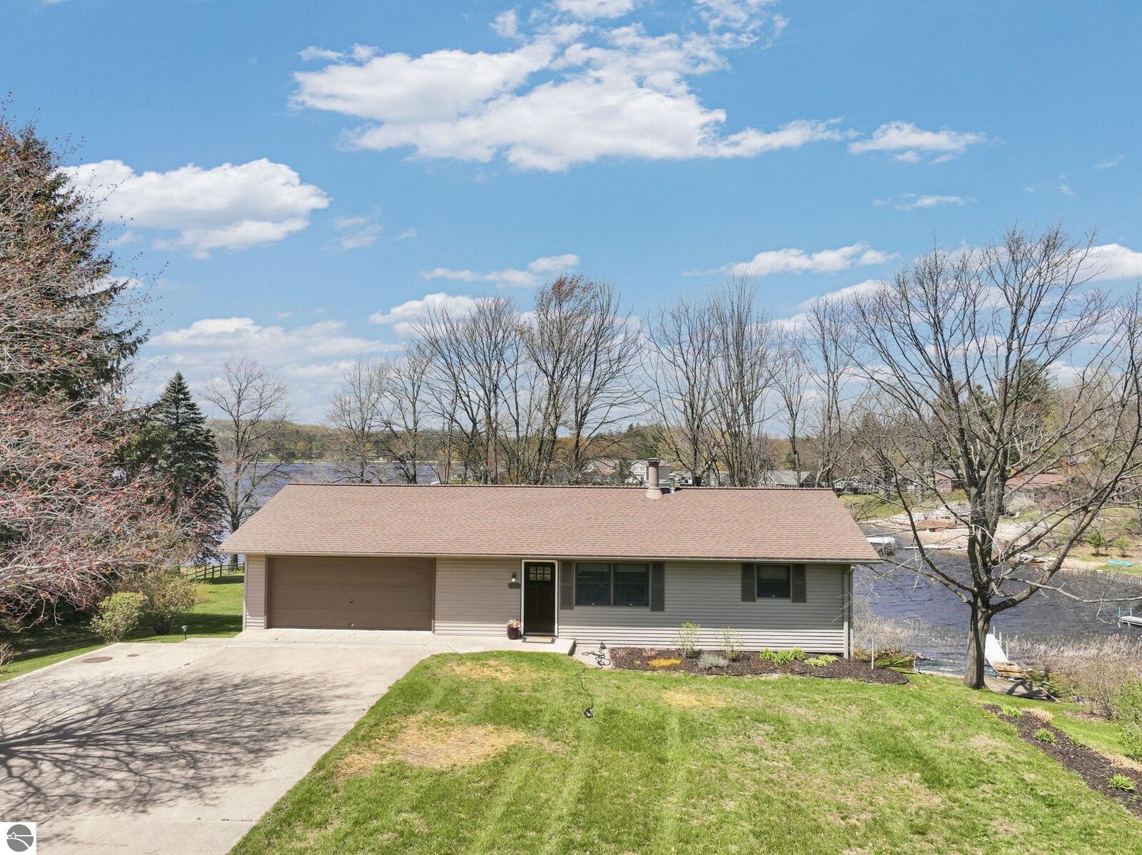 Property Photo:  9561 Peterson Drive  MI 49601 
