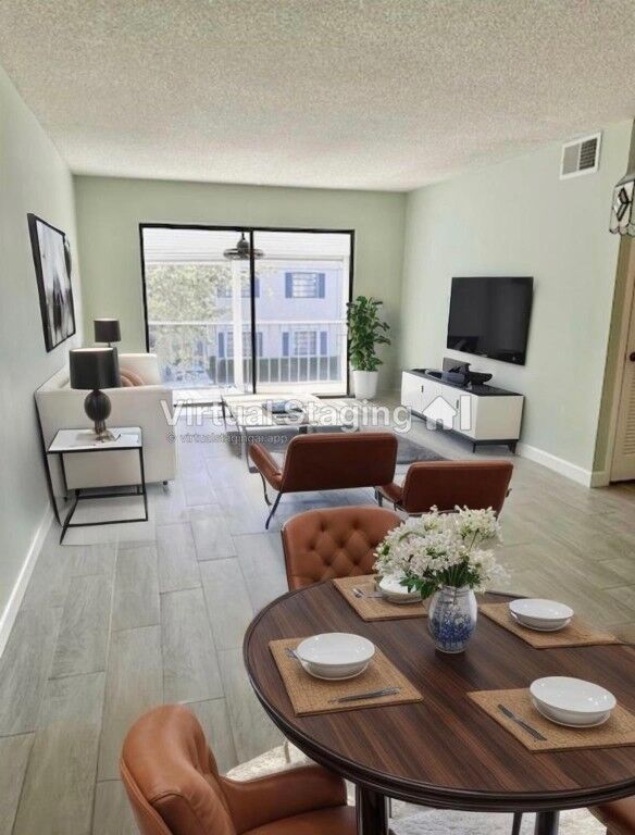 Property Photo: 130 Cypress Club Drive 323 FL 33060