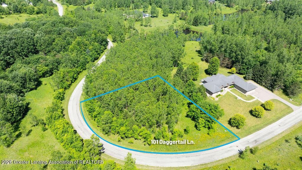 Property Photo:  101 Daggertail Lane  MI 48864 
