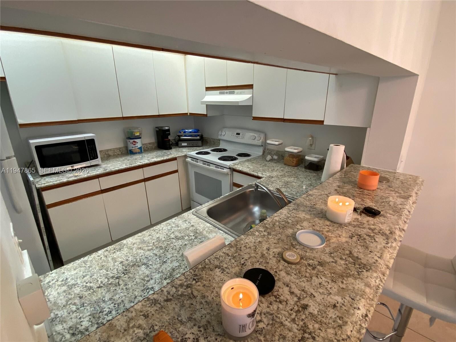 Property Photo:  12950 SW 7th Ct 310A  FL 33027 