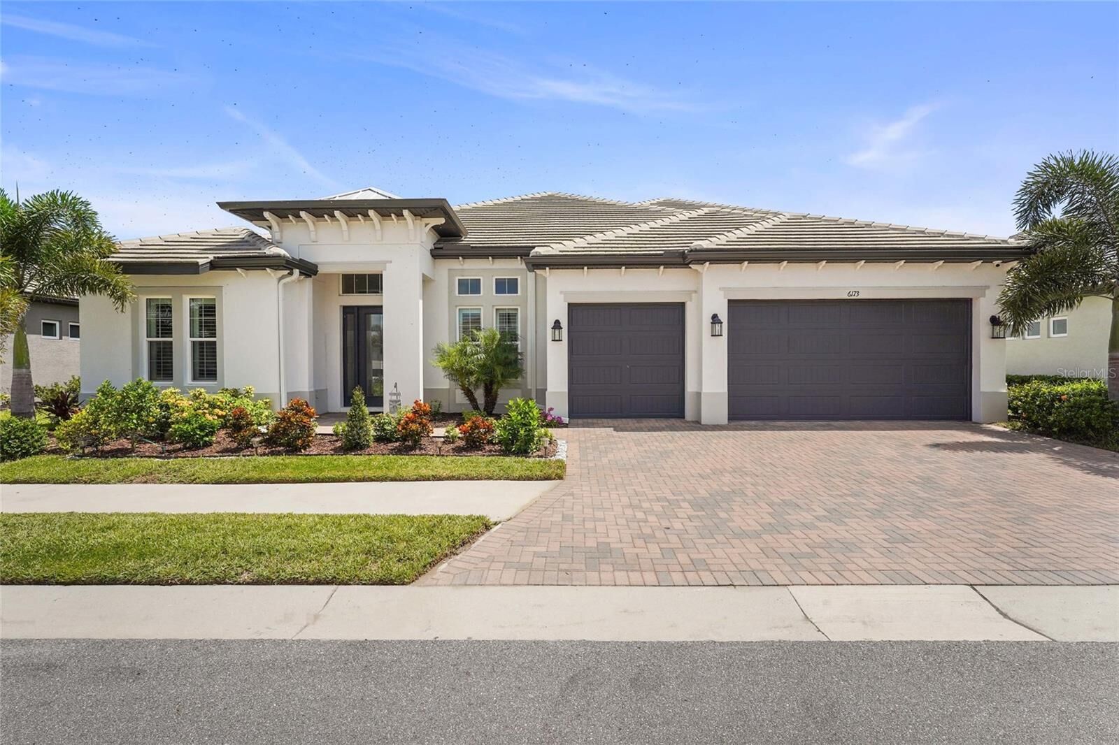 Property Photo: 6173 Lungo Lago Drive FL 34241