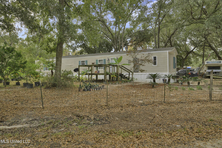 Property Photo:  22155 Bayou Portage Street  MS 39560 