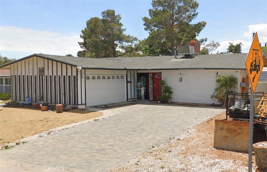 Property Photo:  14316 Burning Tree  CA 92395 