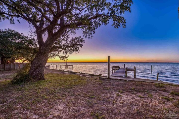 Property Photo: 305 S Garcon Point Rd FL 32583