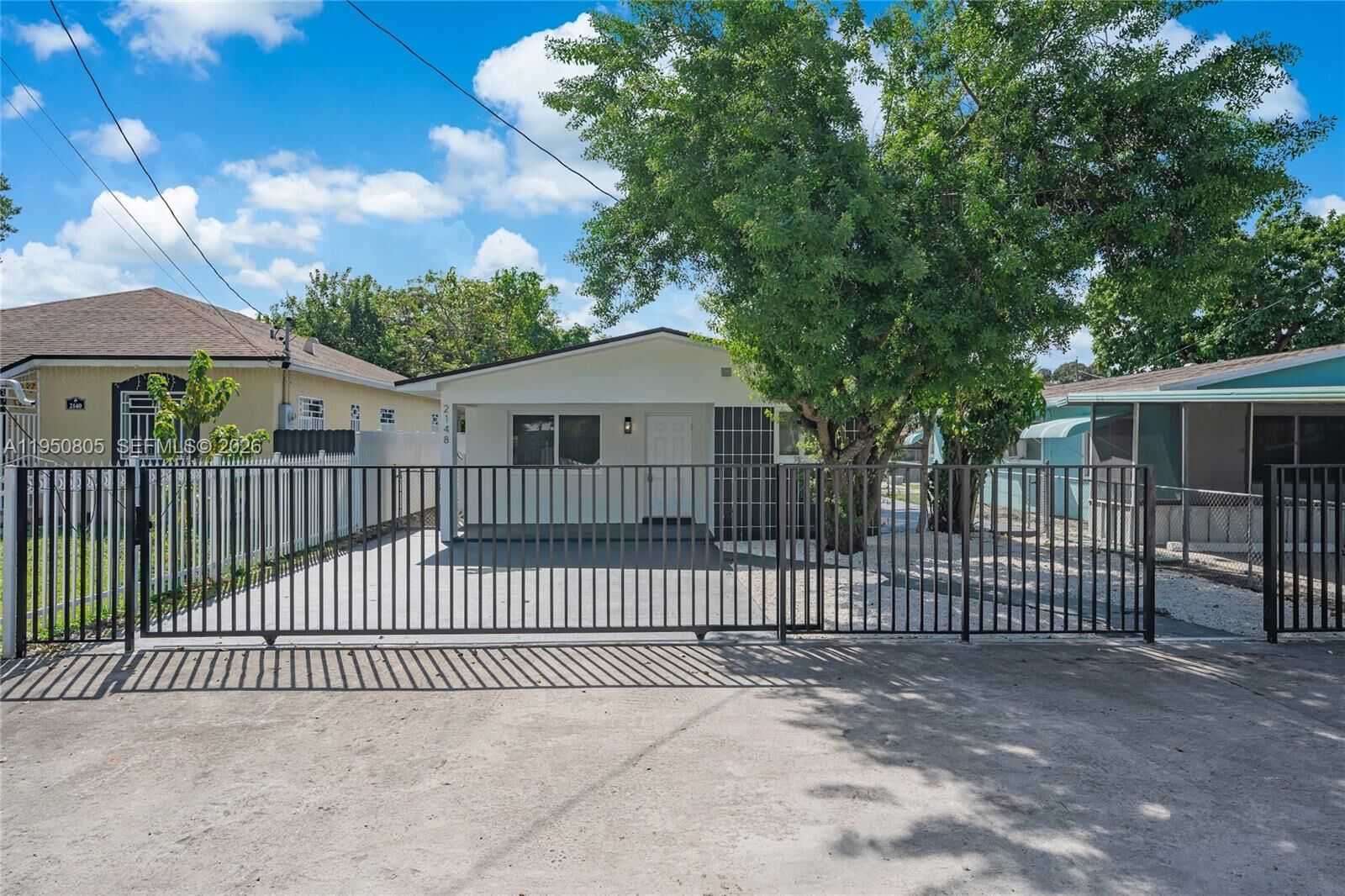 Property Photo:  2148 NW 48th St 2148  FL 33142 