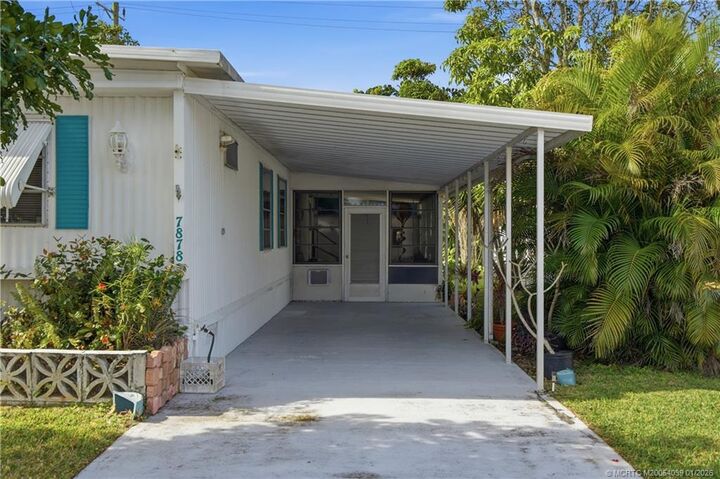 Property Photo:  7878 SE Swan Avenue  FL 33455 