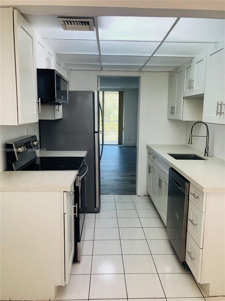 Property Photo:  3070 NW 48th Ter 413  FL 33313 