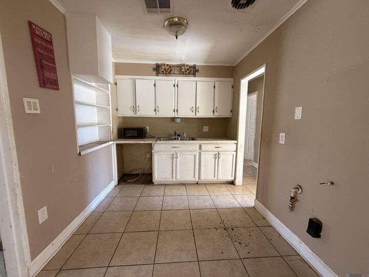 Property Photo: 10663 N Harvey Rd LA 70815
