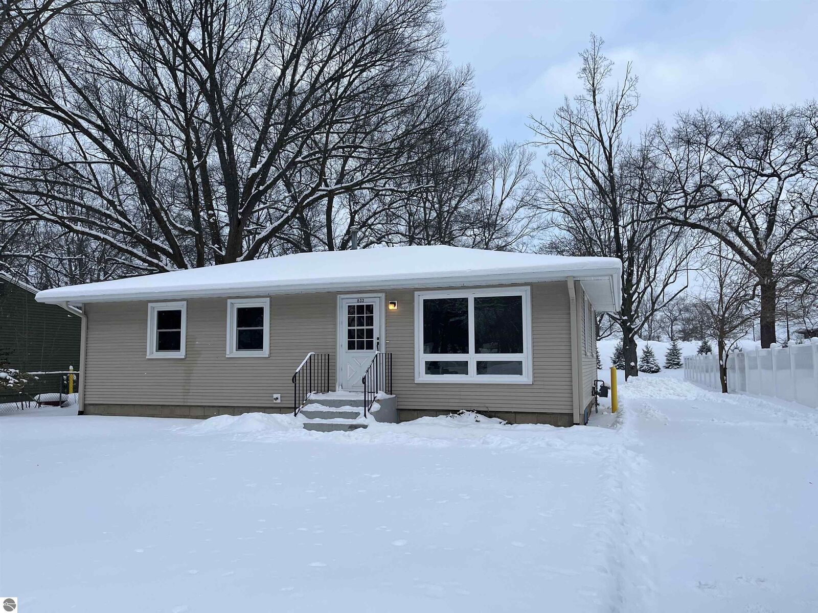 Property Photo:  833 Fern Street  MI 49686 