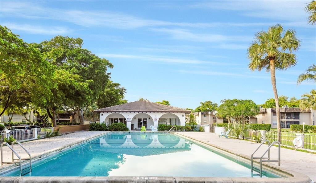 Property Photo:  2700 Riverside Drive 302-B  FL 33065 