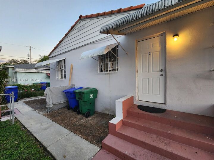 Property Photo:  405 NW 64th St 2  FL 33150 