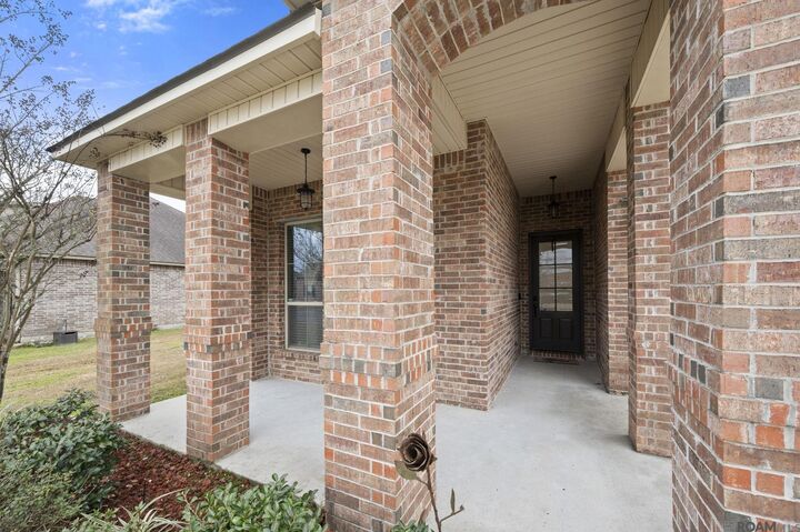 Property Photo:  20348 Grand Crus Ave  LA 70817 