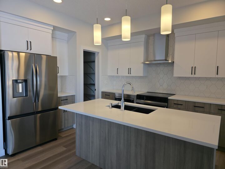 Property Photo:  19007 20 Avenue NW  AB T6M 3E8 