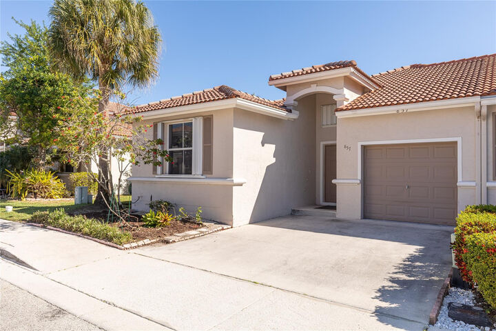 Property Photo:  857 NW 133rd Avenue  FL 33028 