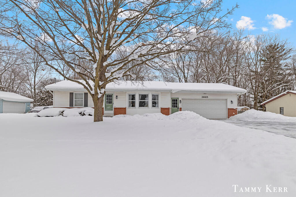 Property Photo:  3665 Remembrance Road NW  MI 49534 