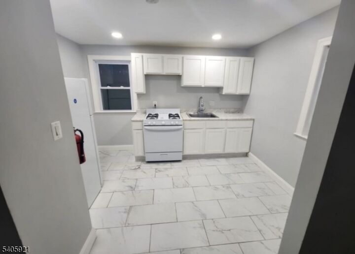 Property Photo:  118 Lenox Ave  NJ 07018 