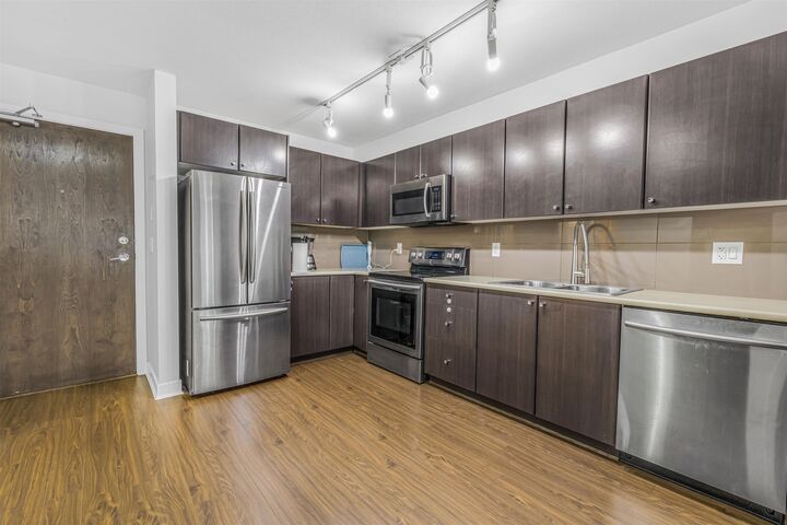 Property Photo: 13740 75A Avenue 202 BC V3W 0E8