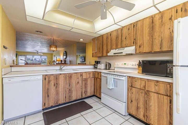 Property Photo:  3832 Snowflake Ln 1207  FL 34112 