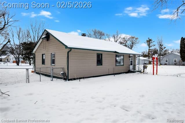 Property Photo:  413 Turrill Avenue  MI 48446 
