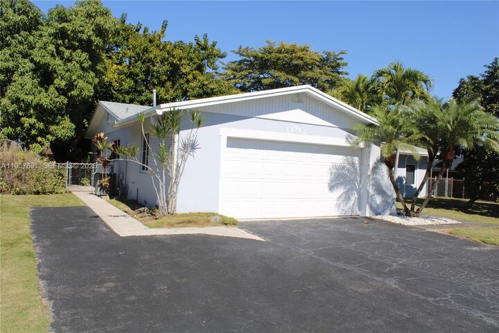 Property Photo: 12965 SW 76th Ter FL 33183