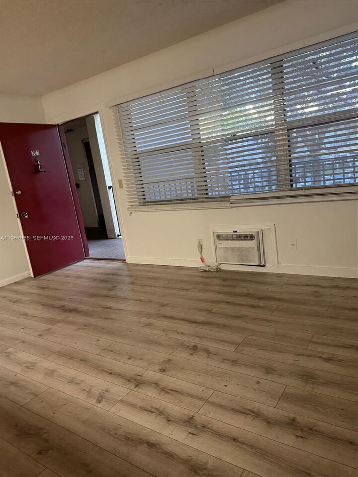Property Photo:  200 SW 132nd Way 207L  FL 33027 