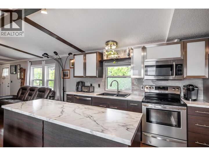 Property Photo: 3381 Village Green Way 70 BC V4T 1L2