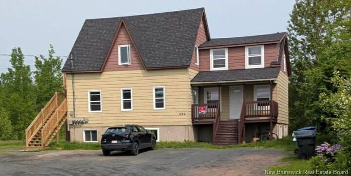 Property Photo: 292 Parc Ouest Street NB E8K 2E8