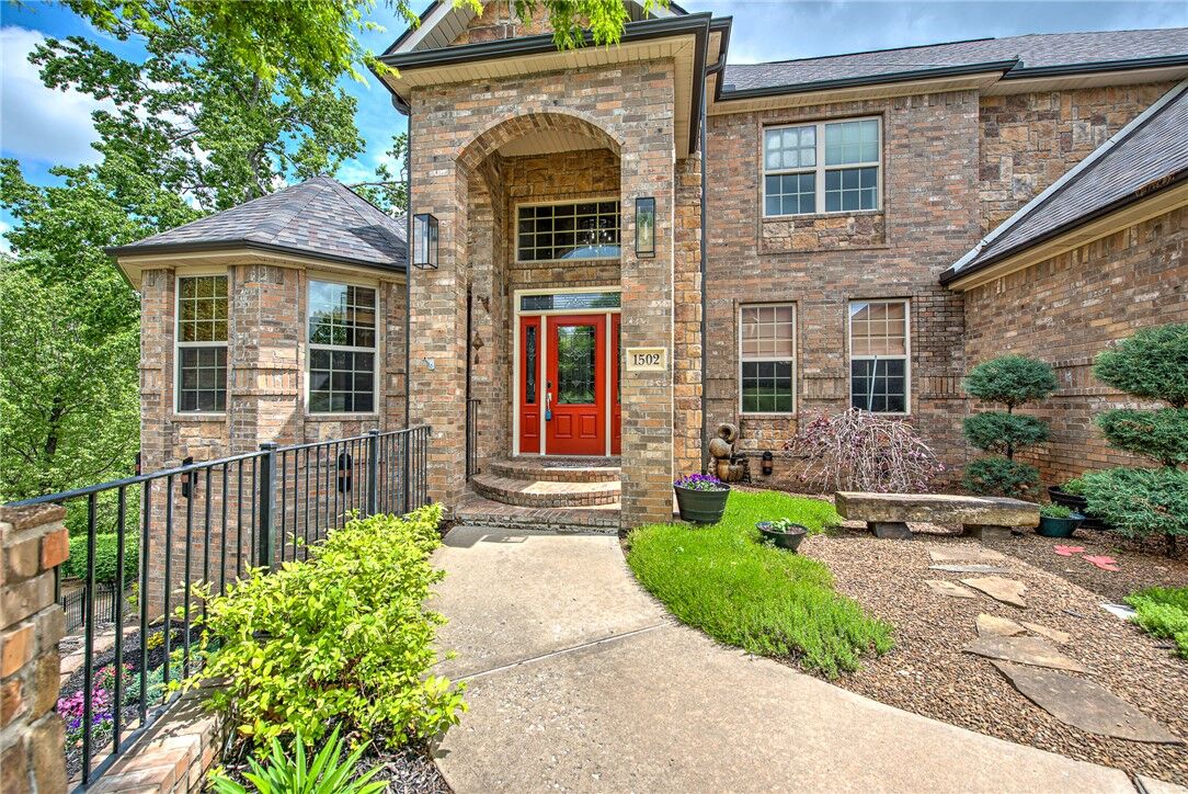 Property Photo:  1502 NE Bluff Spring Avenue  AR 72712 