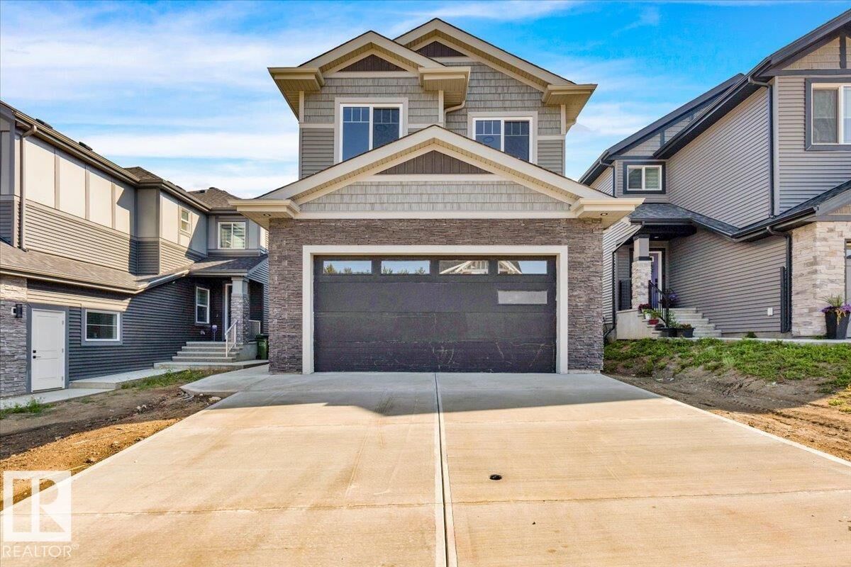 Property Photo:  1154 Gyrfalcon Crescent NW  AB T5S 0S1 