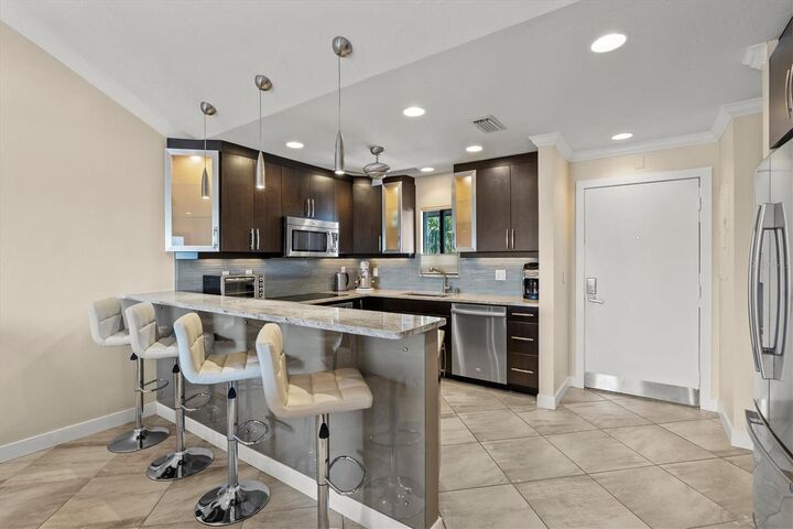 Property Photo:  1624 Stickney Point Road 24-407  FL 34231 