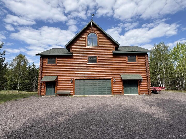Property Photo:  51755 Rice Lake Road  MI 49945 