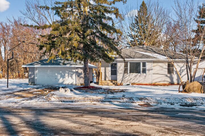 Property Photo:  2561 Harvester Avenue E  MN 55119 