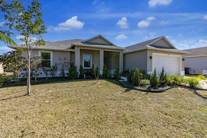 Property Photo:  4037 SW McIntosh Street  FL 34953 