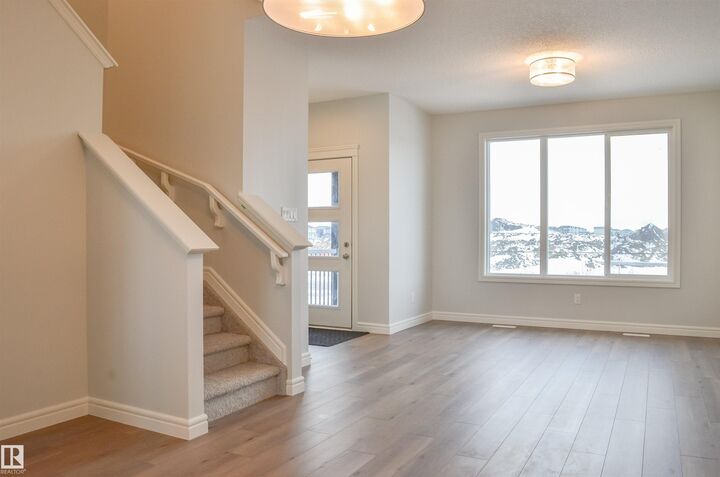 Property Photo:  21031 25 Avenue NW  AB T6M 3C4 