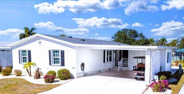 Property Photo:  27110 Jones Loop Rd 295  FL 33982 