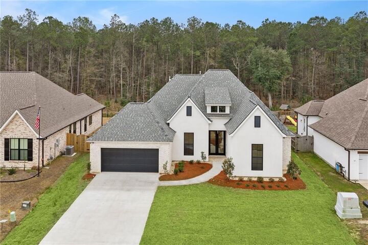 Property Photo: 1205 Fox Sparrow Loop LA 70447